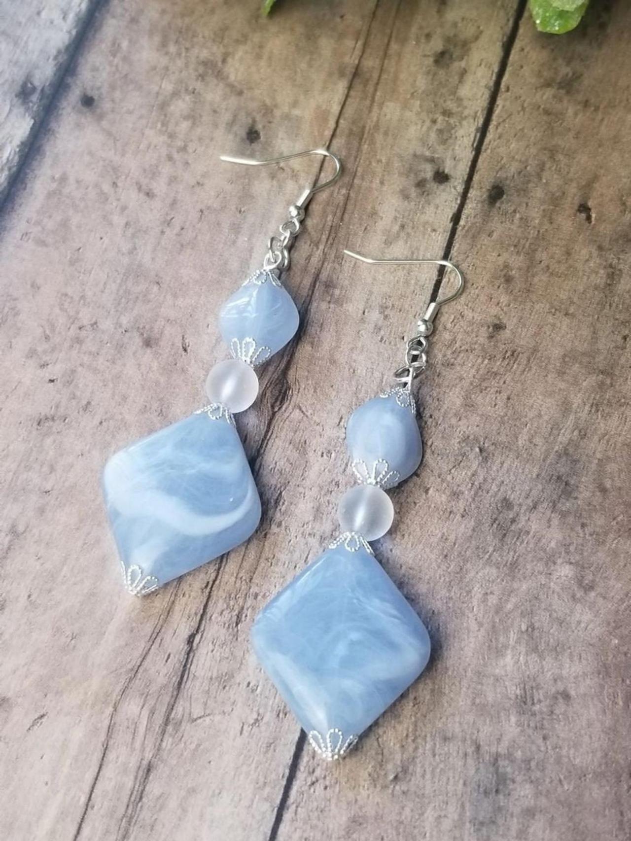 Pale blue drop earrings discount